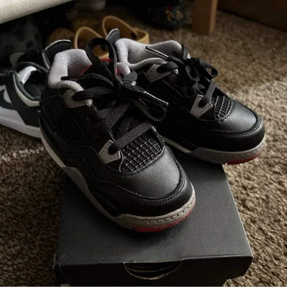 Jordan Black and Gray Athletic Sneakers with Chunky Midsole Nike Air Jordan 1 Retro High OG sneakers in black and gray  main image 3